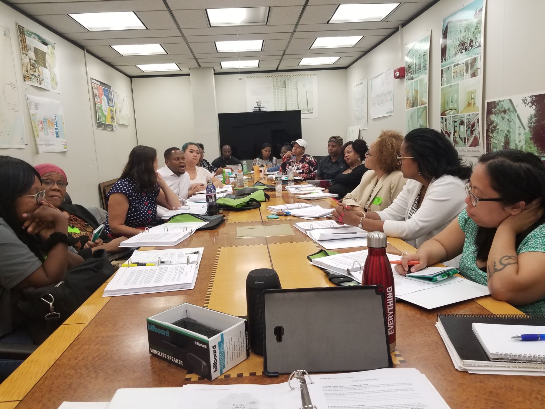 group sitting at a conference table
